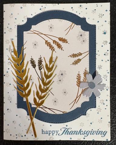 Thanksgiving card in blue and gold with grain and flowers
