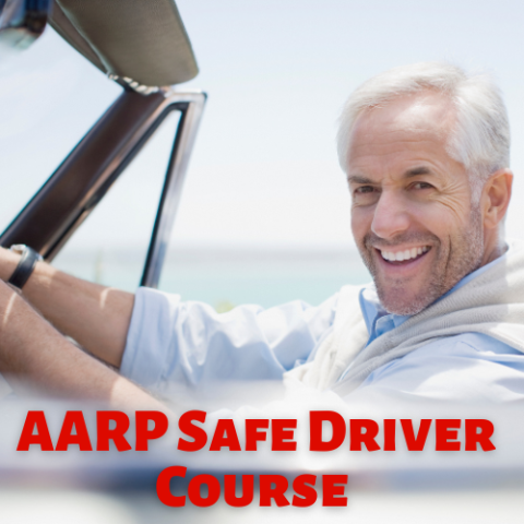 AARP Safe Driver Course a smiling older man sits behind the wheel of a red convertible