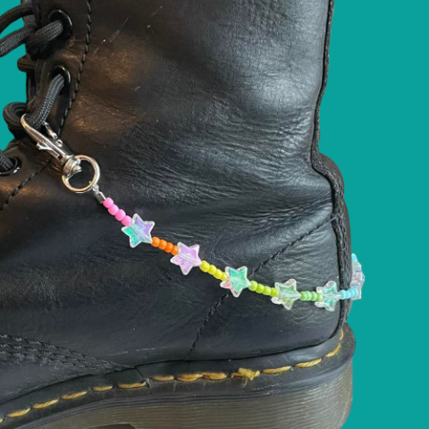 Boot with shoe jewelry. 