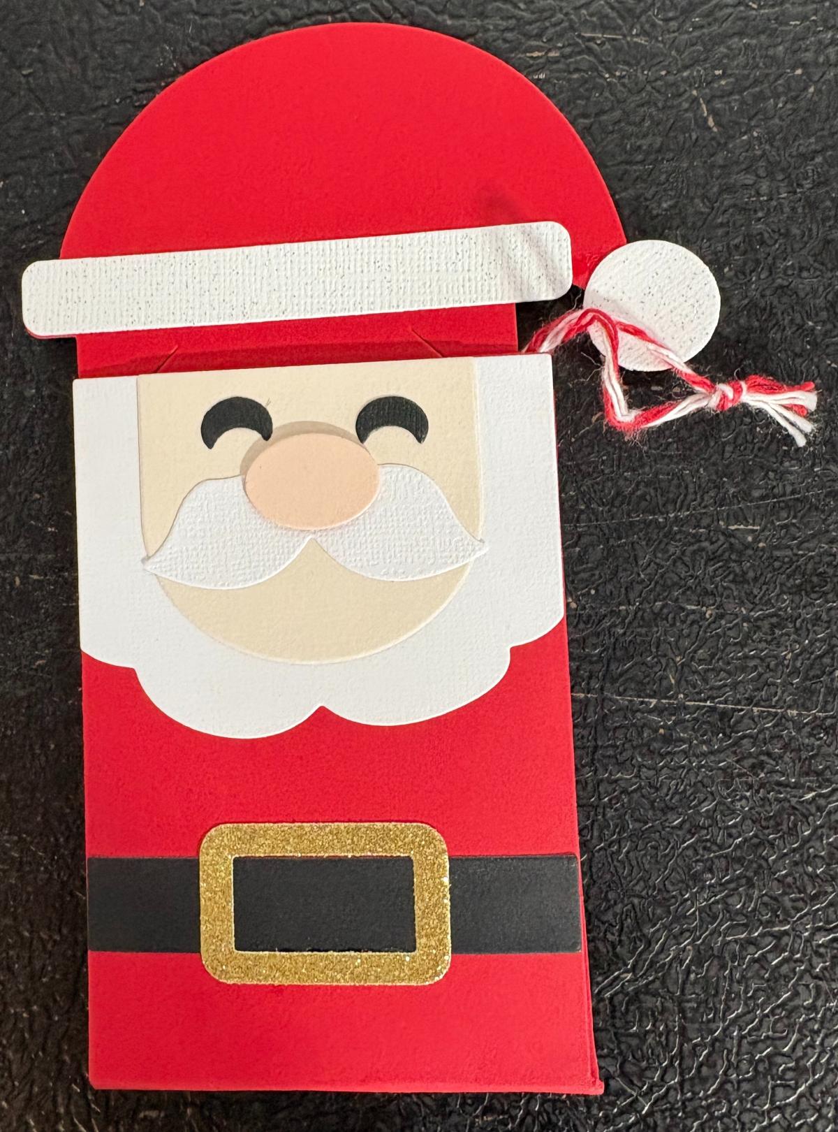 Gift card holder shaped like Santa Claus